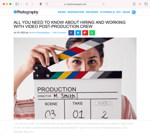 A woman holds up a clapperboard in a stock photo DIY Photography used in republishing our crew article