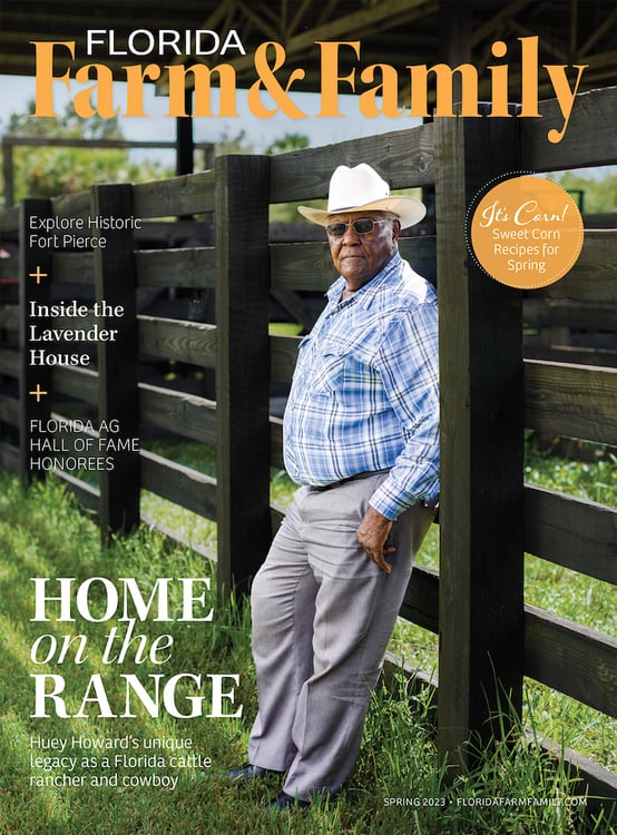 Tear sheet portrait of African American rancher with sunglasses in cowboy hat and blue plaid button-down shirt, by Tampa, Florida-based agricultural photographer Jeremiah Wilson.
