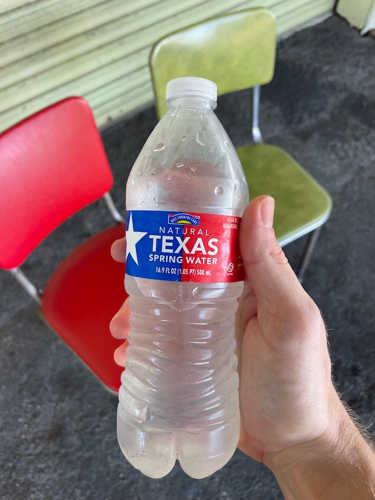 BTS image of a bottle of Texas brand water, by Altamonte Springs, Florida-based portrait photographer Brian Carlson.