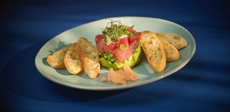 Image of tuna tartare with avocado and micro greens, by Seal Beach, California-based food/drink and music/performing arts photographer Eric Hameister.