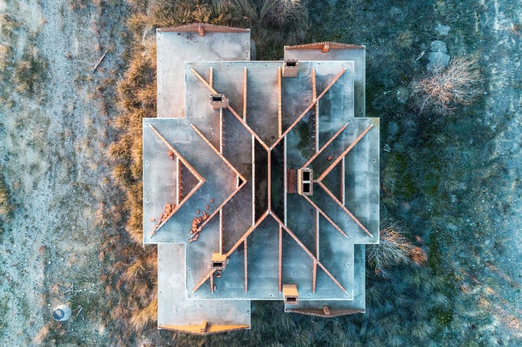 Aerial photo of geometric pattern on roof of abandoned apartment building, by Donostia-San Sebastian, Spain-based social documentary photographer Markel Redondo