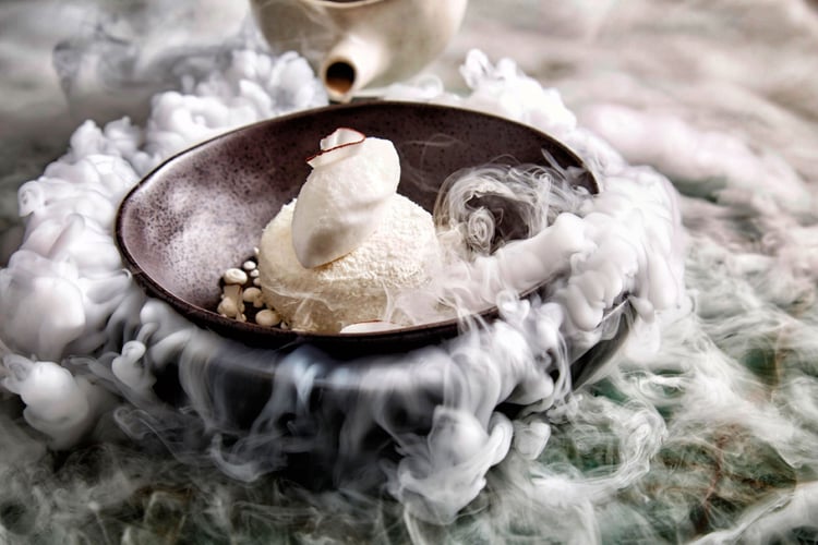 Photo by Danella Chalmers of a heated desert cake with steam flowing all around it.