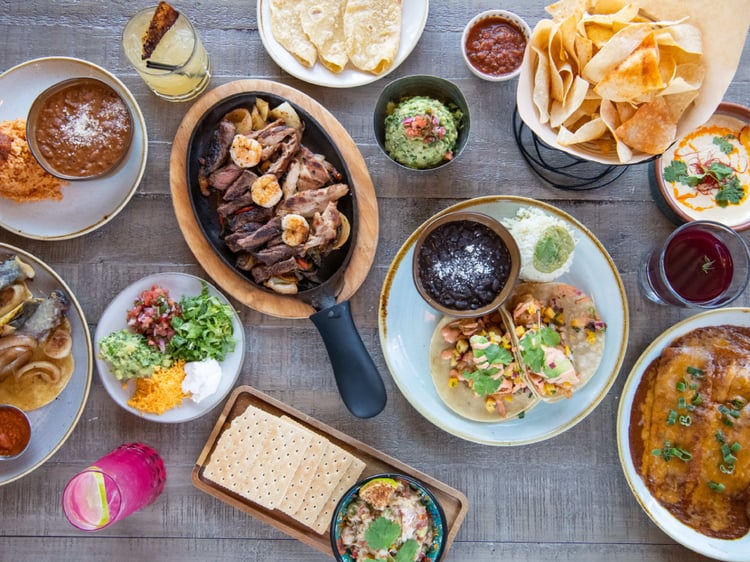 Photo by Nate Watters of an overhead view of a table full of fajita fixings.