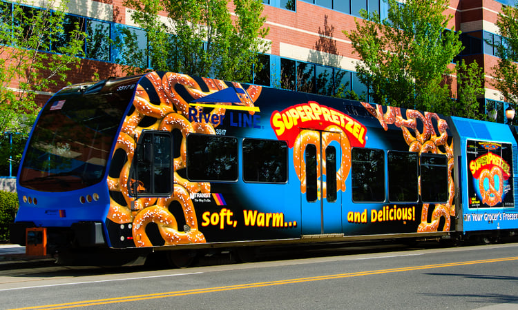 Photo by Todd Linn and Mike Brennan of Superpretzel brand pretzels on the side of a bus.