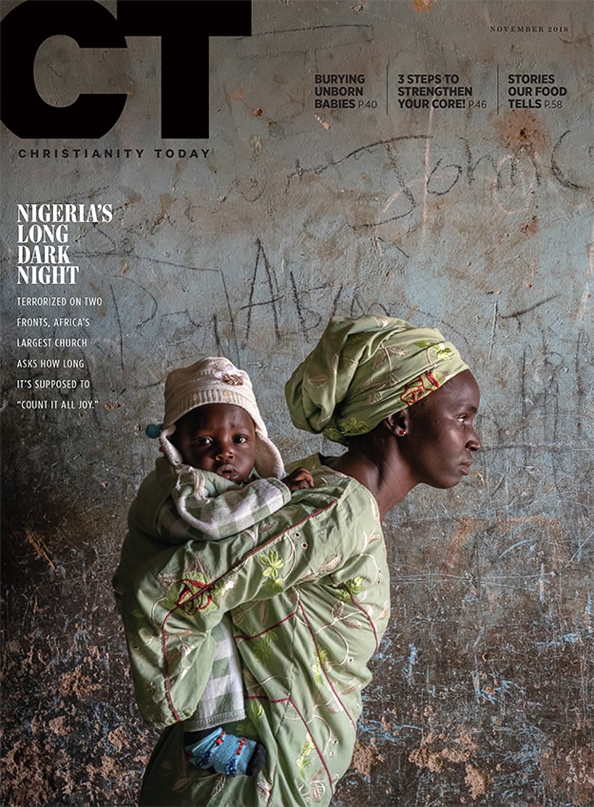 Photograph of a woman holding her child by Gary Chapman on Nigeria's Unrelenting Terrorist Group Violence for Christianity Today.