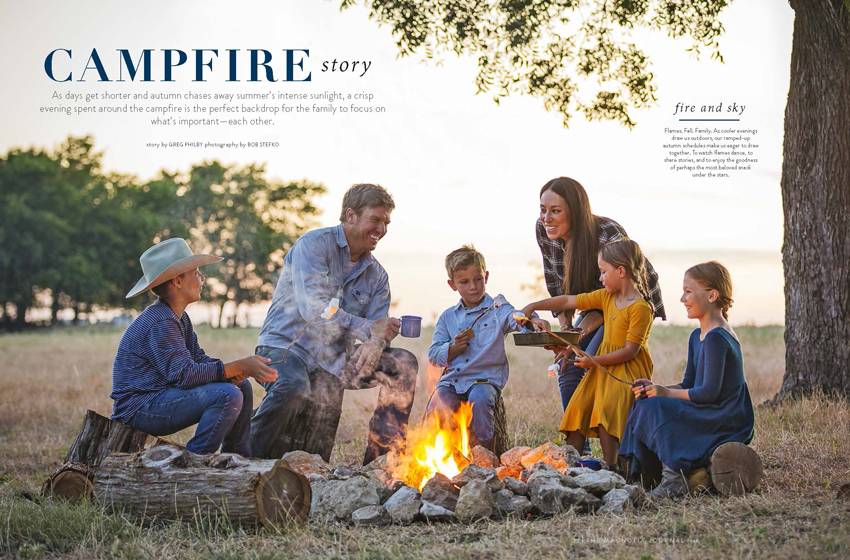 A happy family enjoying smores by a cozy campfire, image by Bob Stefko. 