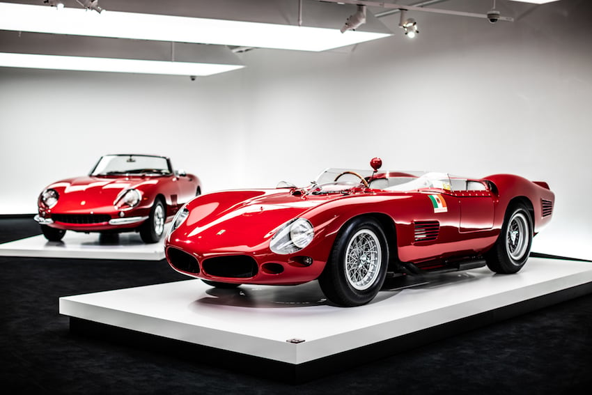 Adam Lerner's photo of two red convertible sports cars belonging to Ralph Lauren for Autoweek 