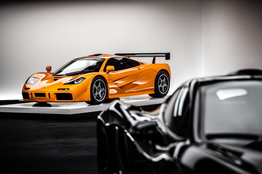 An orange racecar owned by Ralph Lauren is in this photo by Adam Lerner