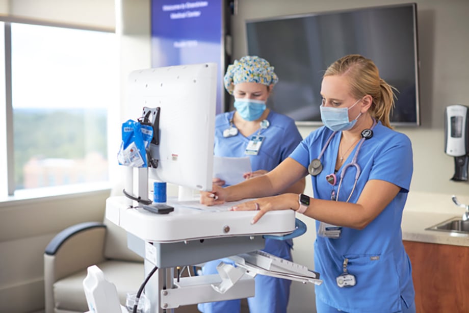 Art Meripol photographs two women in scrubs at Grandview Medical