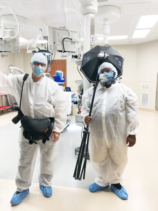 Art Meripol with assistant behind the scenes in full PPE at Grandview Medical