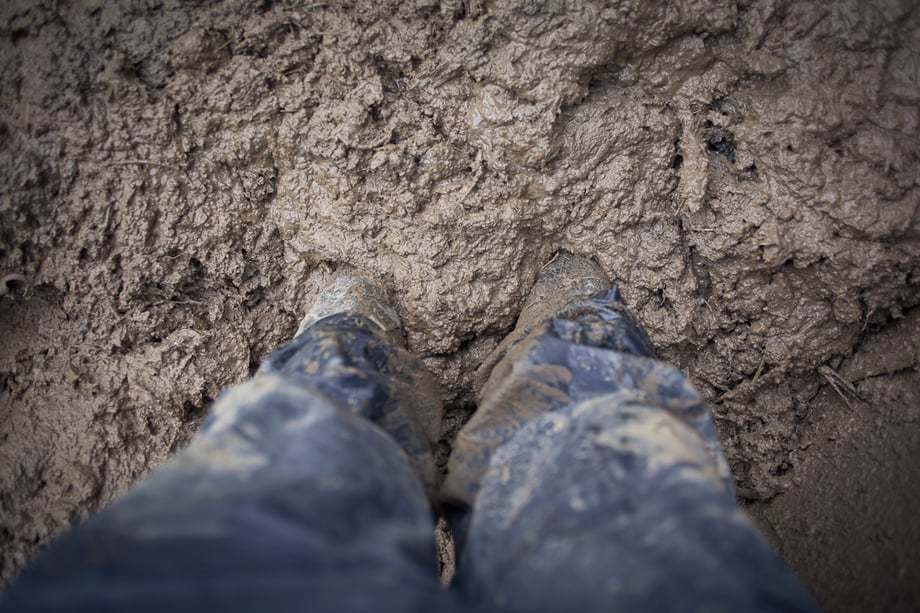 Muddy feet shot by Nashville, Tenn.-based industrial photographer Hollis Bennett