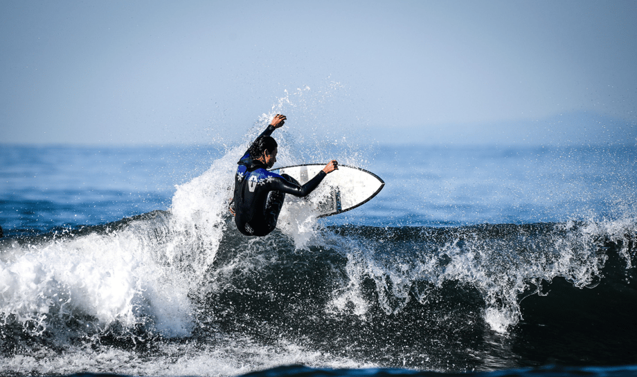 Ben Weller shoots a surfer navigating a wave for Hana Hou!