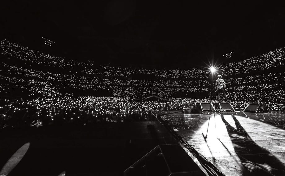 Christie Goodwin captures Ed Sheeran from behind on stage in front of a crowd of 30,000