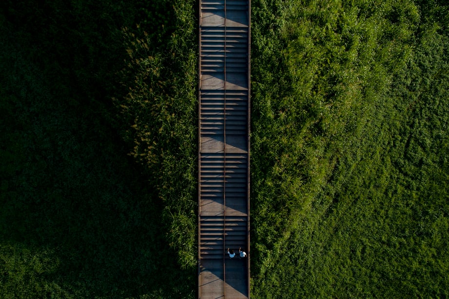 In this drone shot, Daniel Acker centers the sets of stairs leading to the top of Cahokia Mounds