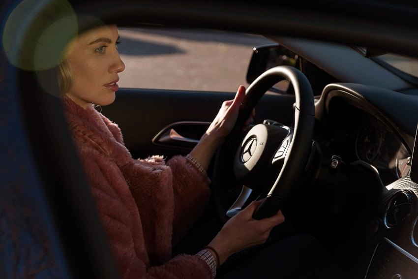 Stanislav Solntsev captures a shot of a woman behind the wheel of a Mercedes rideshare