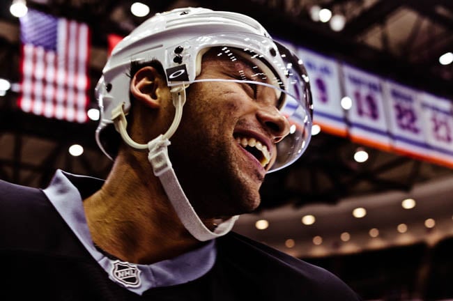 Smiling hockey player up-close shot by Dallas-based portrait photographer Trey Hill for Dallas Stars