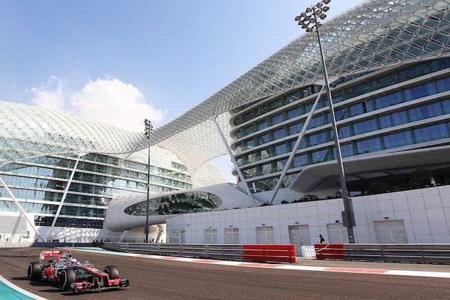 Image from November 3, 2012, showing a race car at the Yas Marina Circuit in the United Arab Emirates, shot by Dom Romney on a sunny day, before the night race, Abu Dhabi Grand Prix, at the Yas Marina Circuit,