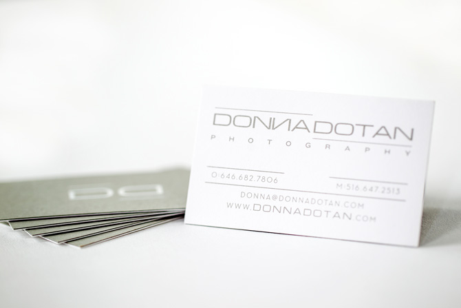 Donna Dotan's business card standing up.