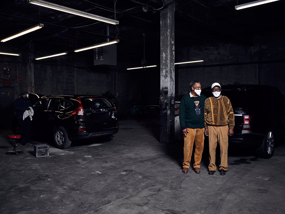 Doug Levy photographs mechanic shop owners for Vistaprint
