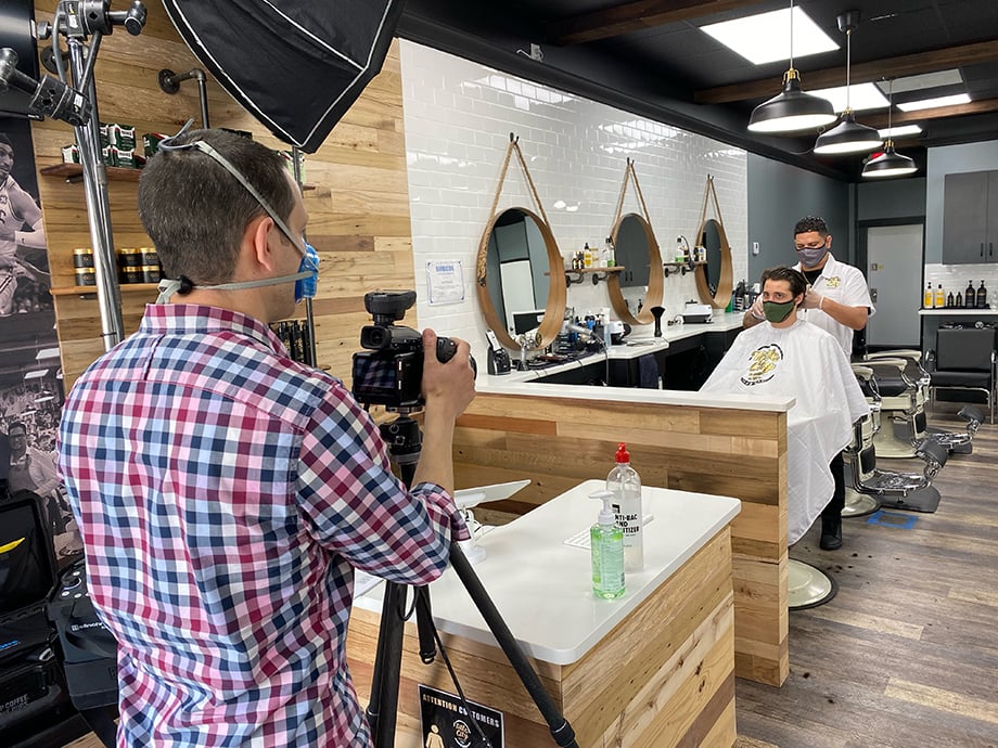 Doug Levy behind the scenes while shooting barbershop for Vistaprint