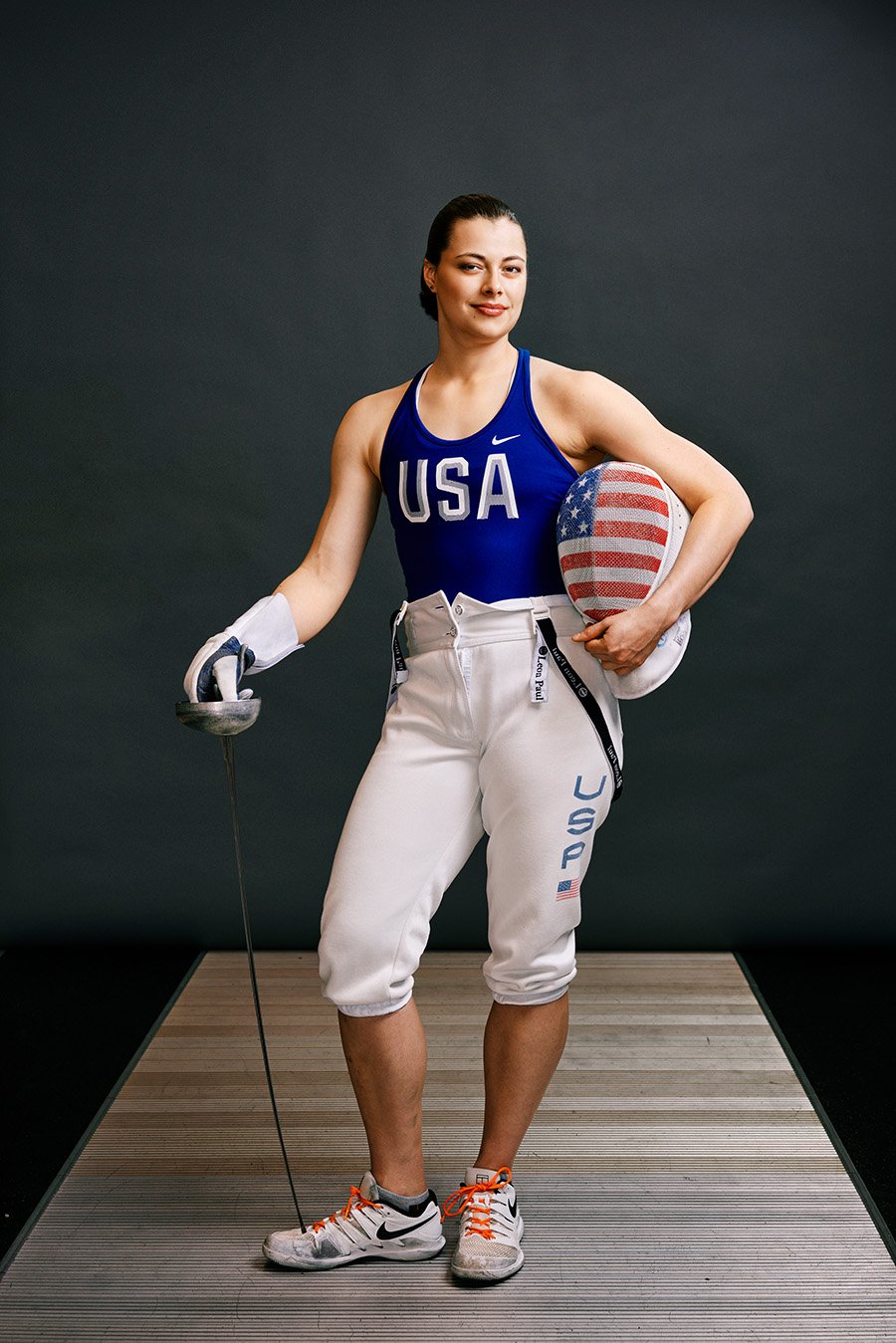 Jeff Wojtaszek's portrait of Kat Holmes in her fencing uniform for Real Woman magazine