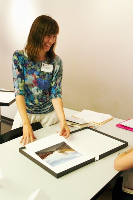 Honore reviewing student work. photo © Lavonne Hall