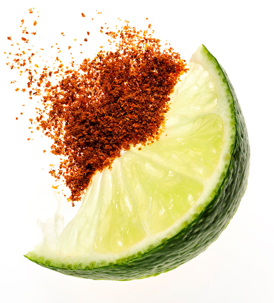 A slice of lemon and chili powder in this photo by Justin Paris
