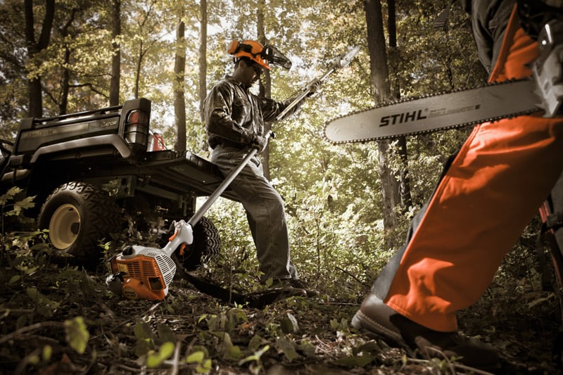 Using equipment in the woods shot by St Louis-based industrial photographer John Fedele for STIHL