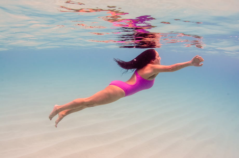 Heather Perry's underwater image of a girl in a pink bathing suit rising to the surface