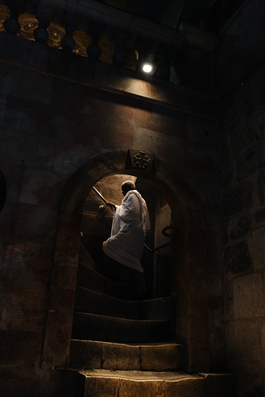David Vaaknin's photo of A Christian pilgrim climbing the stairs leading to the Golgotha