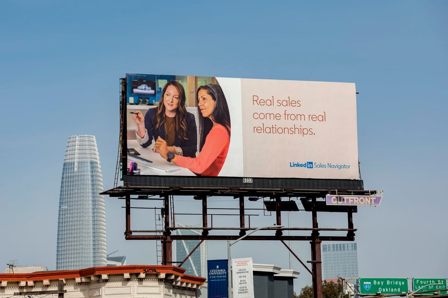 Previous photo by Sabrina Hill is shown here on a California billboard with the words Real sales come from real relationships