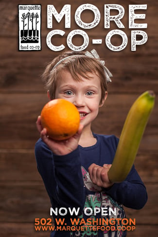 Marquette Co-Op promo featuring Josh LeClair photo of a child with a banana and an orange