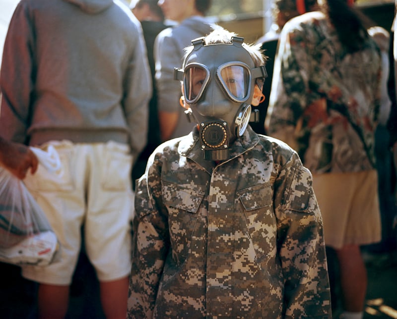 Young boy in gas mask shot by Nashville, Tenn.-based lifestyle photographer, Hollis Bennett