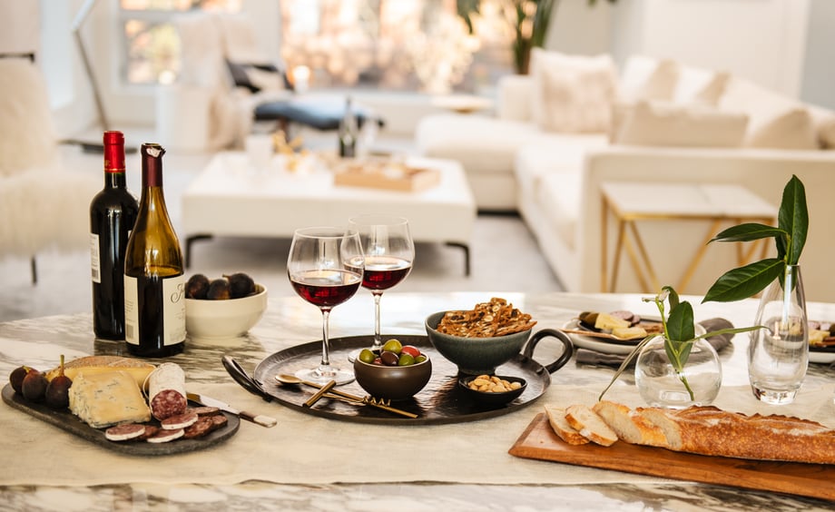 Wine and charcuterie tablescape in a modern kitchen. Shot by Michael Marquand for Modern Charcuterie. 