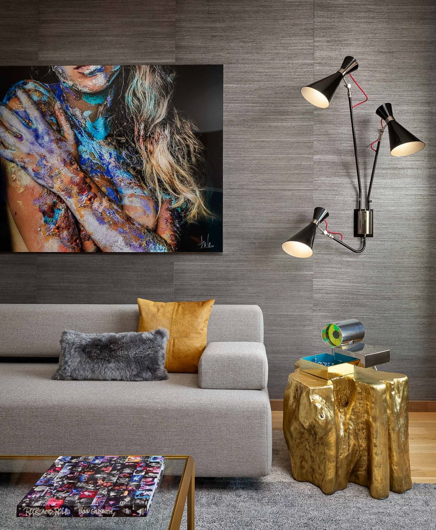 Photo of a part of a living room decorated with modern art for Pepe Calderin NYC.