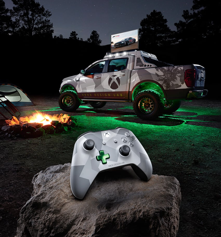 Xbox controller at campfire with Ford truck