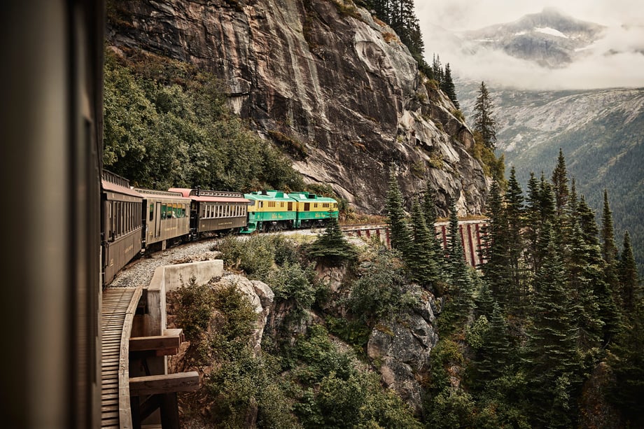 Mark Katzman's shot of the train ride shows several cars rounding a bend on the side of a mountain with a huge drop on the other side