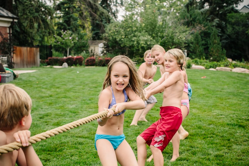 Photograph by Julia Vandenoever of children playing tug-a-war