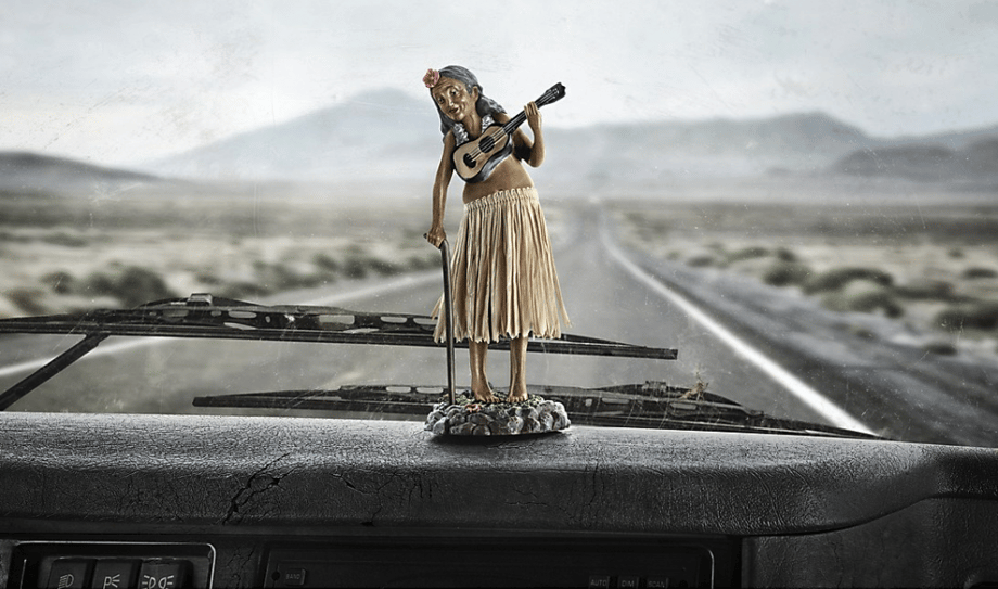 Image of Hula toy on car dashboard shot by Atlanta-based portrait photographer John Fulton