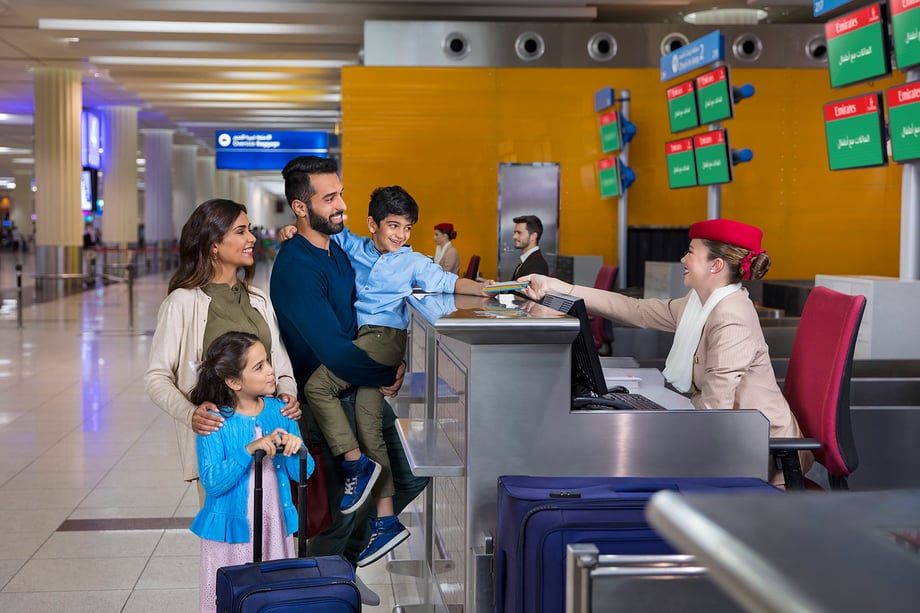 Richard Boll's image for Emirates Airlines shows a family of four at the Dubai Airport check-in