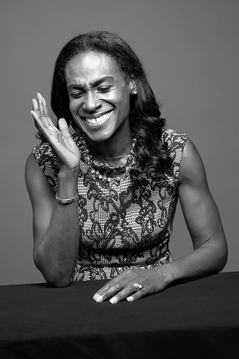 Scott Areman photographs Charlene Thomas laughing for Black Voices from Big Brown by UPS