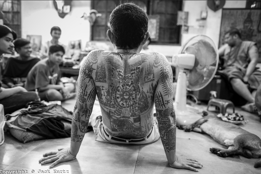 A man's tattooed back, photograph by Jack Kurtz