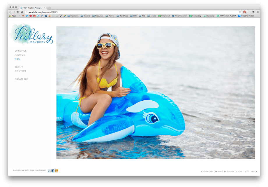 Hillary Maybery's kids gallery featuring a child on an inflatable dolphin.