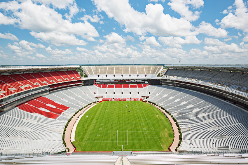 An empty stadium at the University of Alabama by Giacomo Fortunato 