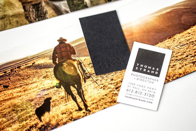 Thomas Strand materials showing a cowboy image in the open print promo.