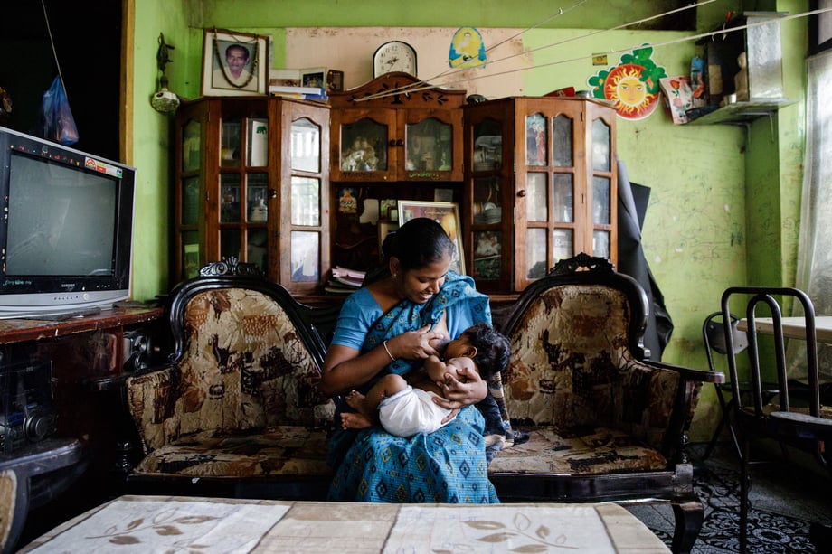 Tina Boyadjieva for Lansinoh photographs a mother from an affluent neighborhood in Sri Lanka breastfeeding her child