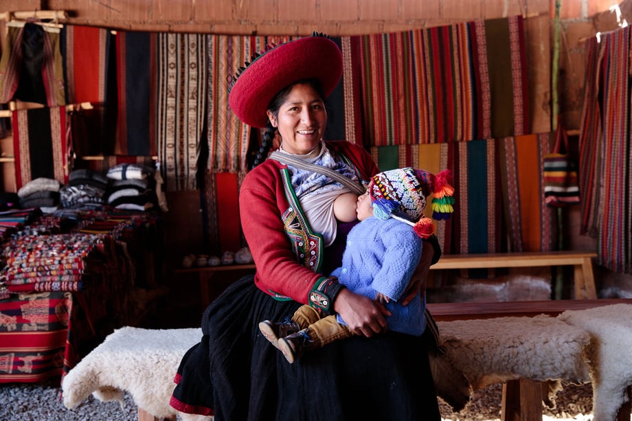 Tina Boyadjieva captures a young mother breastfeeding in a gloriously comfy looking carpet shop for Lansinoh USA