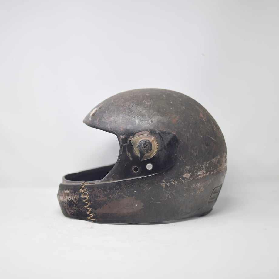 Tobin's favorite shot of his own helmet, which is shown stitched up at the bottom, showing resourcefulness