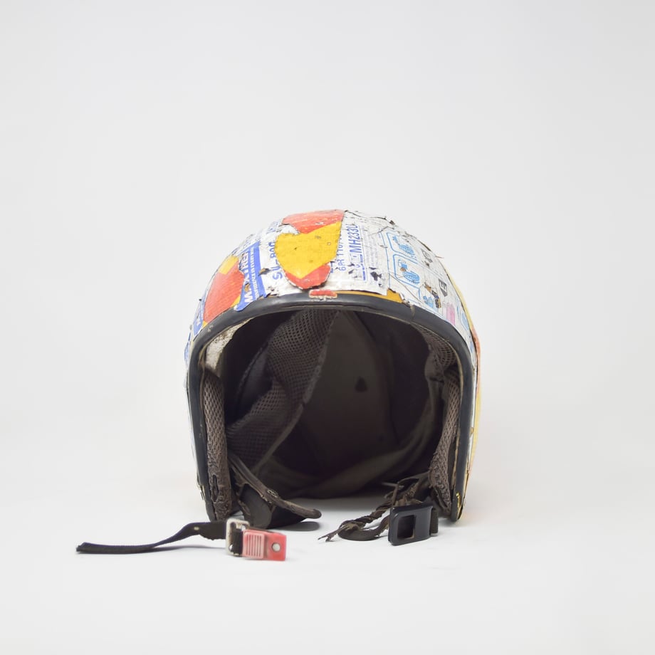 Tobin Jones shoots this simple helmet covered in duct tape and stickers from the front