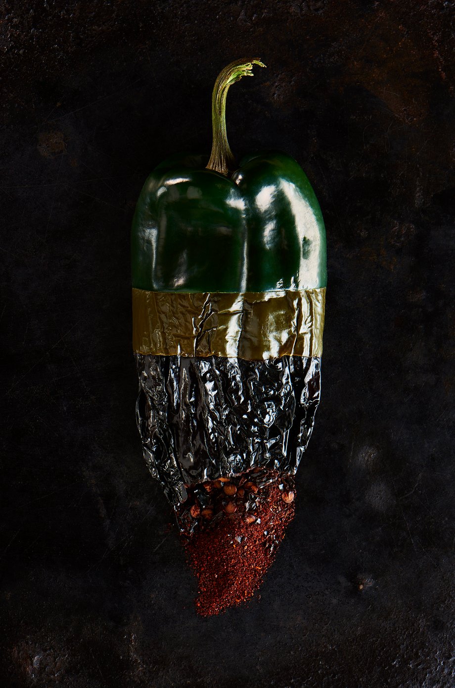 Justin Paris snaps a photo of a hot pepper that looks fresh at the top and takes on different colors and textures  as though roasted